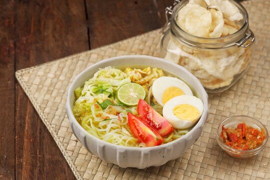 Soto ayam is a typical Indonesian food in the form of a type of chicken soup with a yellowish sauce. This yellow color is due to turmeric which is used as a spice