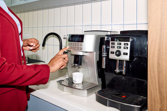 Anonymous Woman Brews Espresso