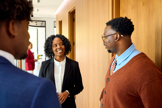Colleagues encountered each other in the hallway