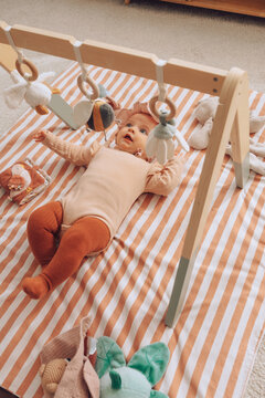 Baby on practising on floor