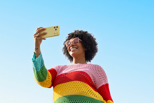 Black woman smile Portrait cell phone 