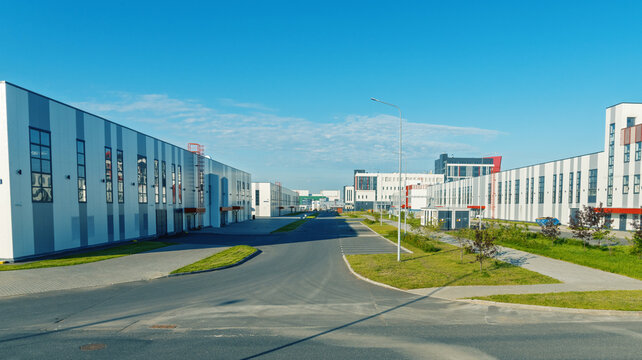 Modern industrial business park with clean streets and low-rise office buildings