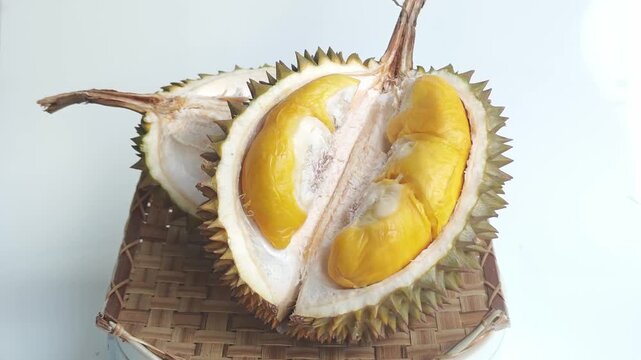 durian on a white wooden surface