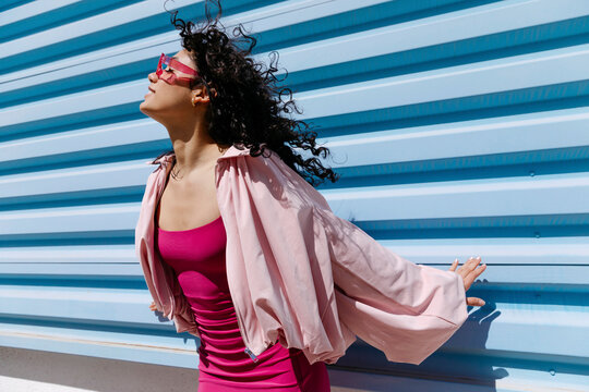 Woman with curly hair enjoying 