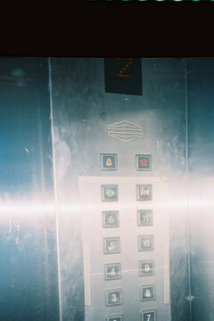 Elevator Panel with Floor Numbers Lit by Direct Flash