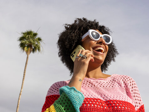  Black woman talking on cell phone smile 