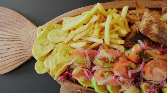 Delicious fried fish and seafood platter with french fries