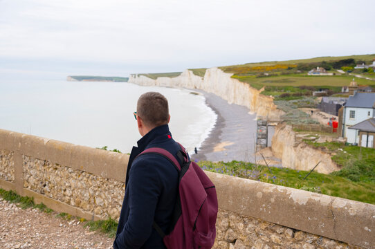Traveler enjoying Seven Sisters Cliffs ocean view