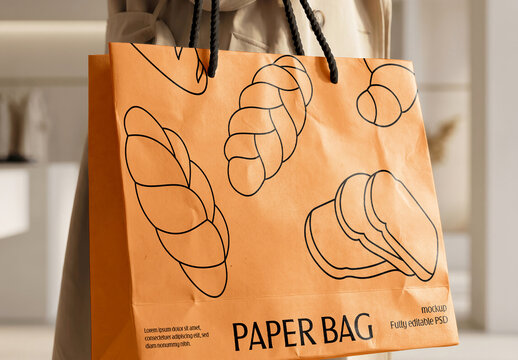 Woman Holding Paper Shopping Bag Mockup