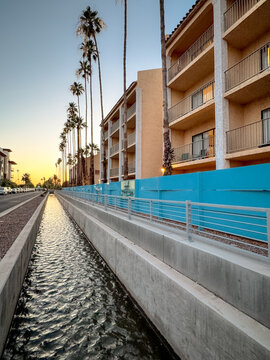 Chandler, Arizona, USA - May 8, 2026: Waterway and canal system in Chandler during golden hour in the Phoenix metropolitan area.
