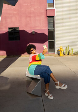 African American woman selfie  cell phone Portrait city street