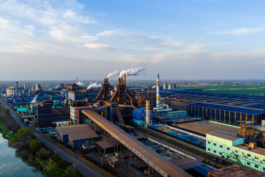 Aerial view of steel plant with blast furnaces and smoke stacks