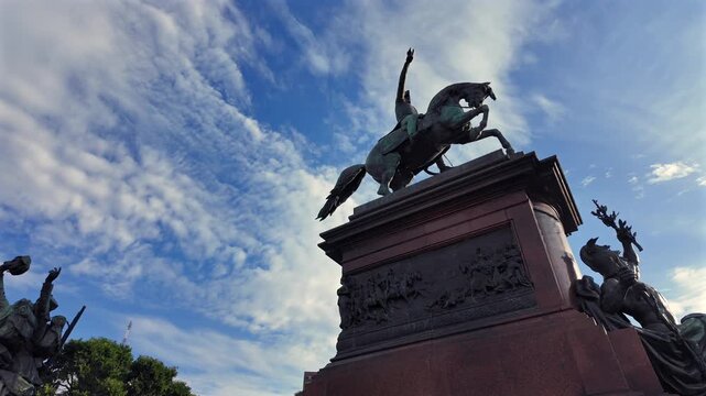 Side view of the bronze figure of the hero General San Martin marking the liberating path from Retiro square in Buenos Aires Argentina.