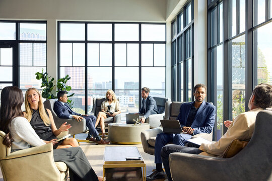 Business Meetings Takes Place in Corporate Lounge Space