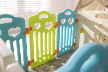 Beautiful playpen and wigwam in child's room, closeup © New Africa