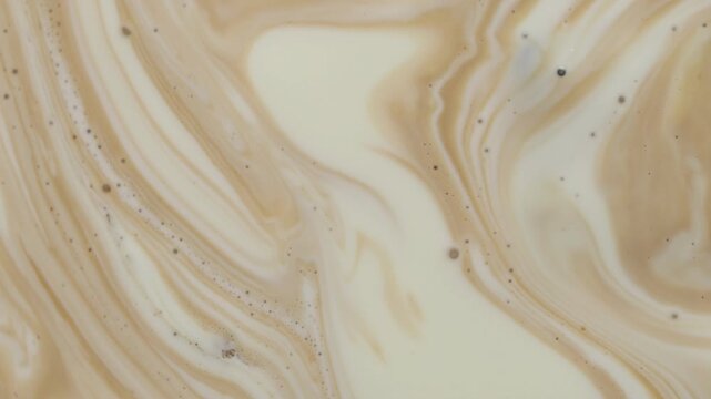 Delicious coffee with milk and bubbles as background, top view