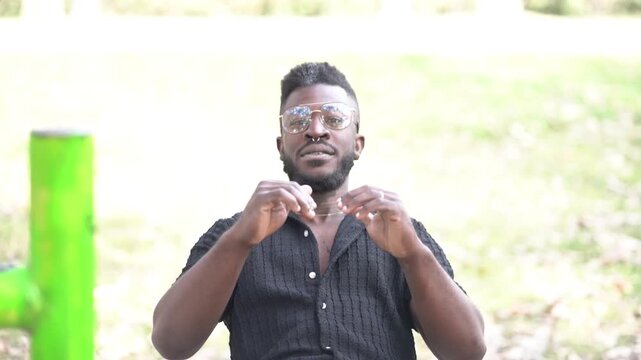 Black Latino Man Doing Abdominal Exercise in Park