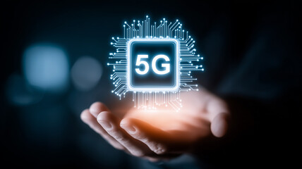 Fototapeta premium A hand presenting a 5G microchip hologram representing next generation connectivity, wireless communication, smart networks and digital innovation. 