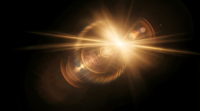 Golden cinematic lens flare burst on black background with warm rays premium glow and light overlay