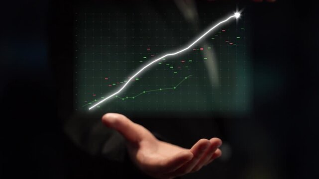 Hand reaching out to display a rising stock market graph with green and red bars, showcasing upward momentum and suggesting investment potential in finance. Copula
