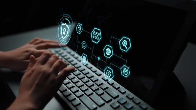 Digital Security Concept with Hands Typing on Keyboard and Futuristic Icons Representing Protection and Technology on Laptop Screen. Entropy.