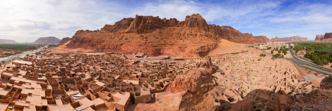Aerial panoramic view of the ruins of the historical mudbrick houses of AlUla Old Town in Saudi Arabia