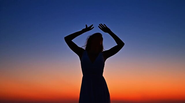 Sunset dance with calming choreography for trance meditation at sunset time by the ocean