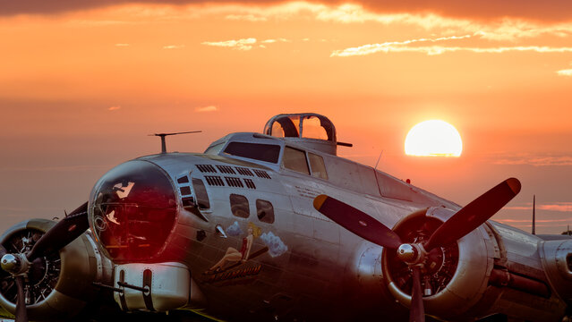 B-17bomber parked at sunset