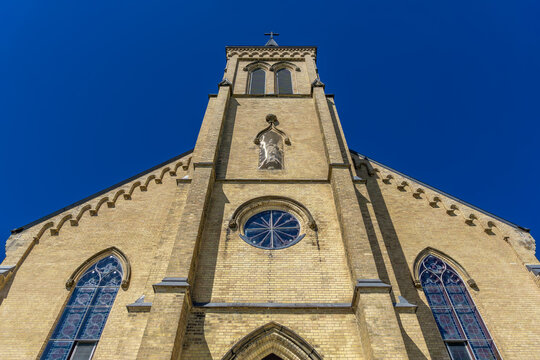 Historic Saint Joseph's Catholic Church in Stratford, Ontario, established in the 1860s with traditional ecclesiastical architecture and spiritual importance to the local community.