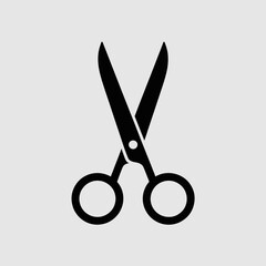 Fototapeta premium A black scissors icon isolated on a light gray background