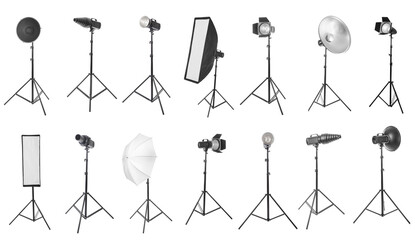 Professional photography studio lighting equipment collection with various flashes, softboxes, and umbrellas on stands © Pixel-Shot