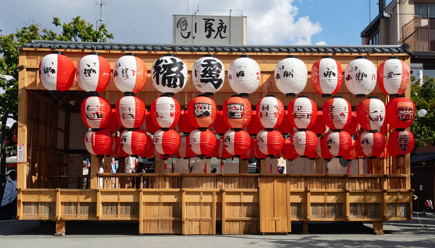 Traditional Japanese Festival Float Decorated with Numerous Red and White Lanterns.