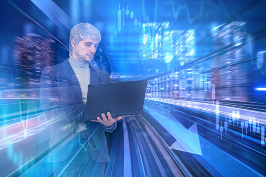 Financial technology. Business analyst uses laptop for market data analysis and digital trading in a futuristic urban network.