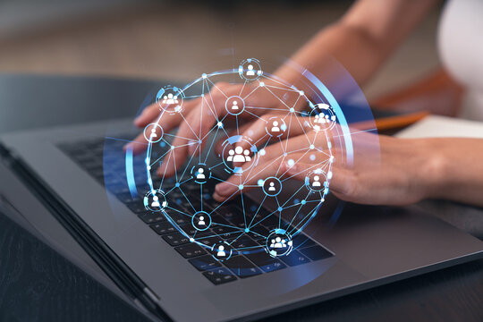 Woman typing on laptop at office workplace in background. Concept of working process, internet surfing, online business education. Student send e-mail. Close up view. Social network icons