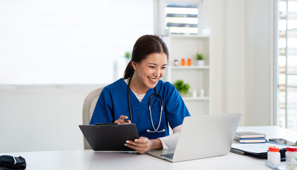  professional  doctor using laptop computer in hospital office watching medical webinar training,...