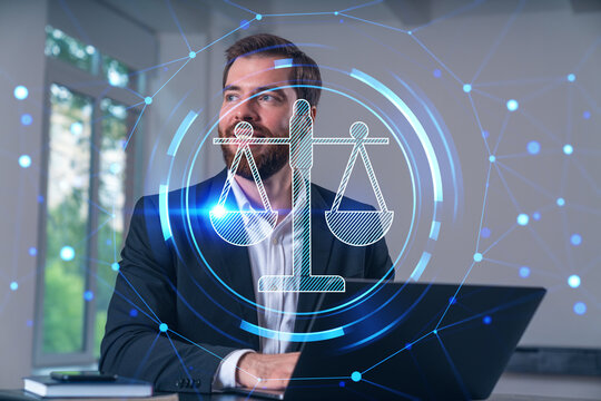 Smiling businessman in formal wear working on laptop at office workplace with smartphone and notebooks. Concept of successful business deal, agreement. Legal and law icons.