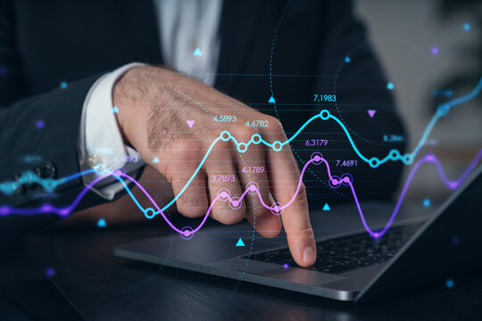 Woman typing on laptop at office workplace in background. Concept of working process, internet surfing, online business education. Student send e-mail. Close up view. Hands Shot. Stock market chart