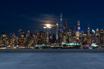 Obraz premium Skyscrapers Cityscape Downtown, New York Skyline Buildings. Beautiful Real Estate. Night time. Empty rooftop View. Success concept.