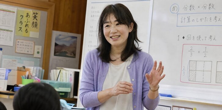 Generative AI, Cheerful Asian female teacher teaching math in front of a whiteboard in a classroom