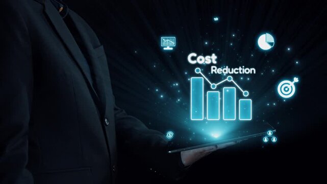 A businessman interacts with a digital tablet displaying holographic icons focused on cost reduction and analytics, highlighting modern financial strategies in a sleek workspace. Qubit