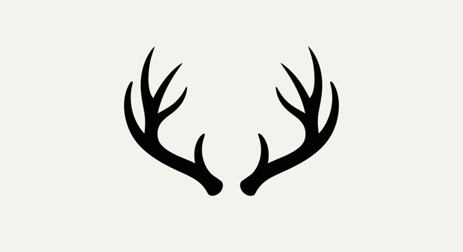 Elegant Black Silhouette of Deer Antlers on a Bright Studio Background