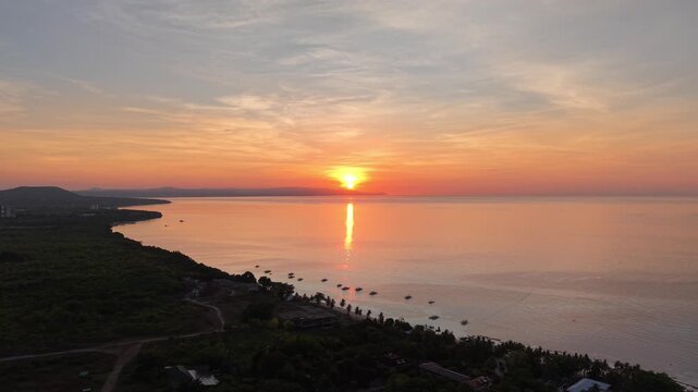 Aerial Pull-Back Reveal of Panglao Coastline at Sunrise