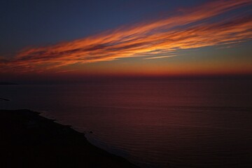 Fototapeta premium Aerial drone photo of sunset sky over the sea near Teuri Island from Yagishiri Island, Hokkaido, Japan