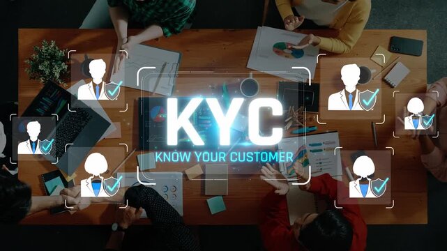 Lively Meeting Focused on Know Your Customer KYC Strategies with Professionals Collaborating Around a Wooden Table View from Above Sigmoid