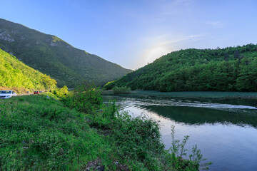 Fototapeta premium Beautiful mountain range with a river running through it