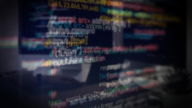 Computer Monitor Screen with Colorful Programming Code Lines Blurred Background Close Up