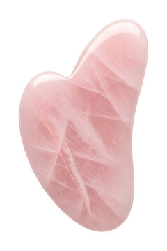 Polished pink rose quartz heart shaped gua sha tool for facial massage isolated transparent background image