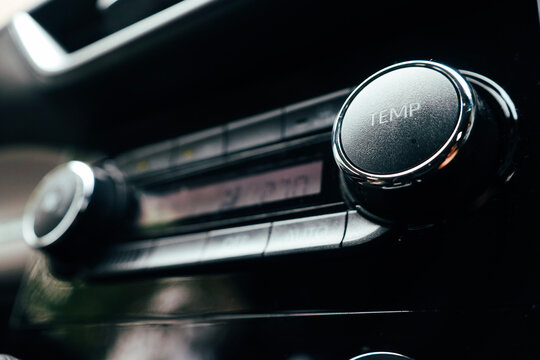 Air conditioner control panel of a car.