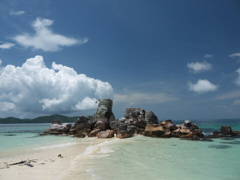 Natural Sandspit Path Leading to Unique Rocky Outcropping in Thailand