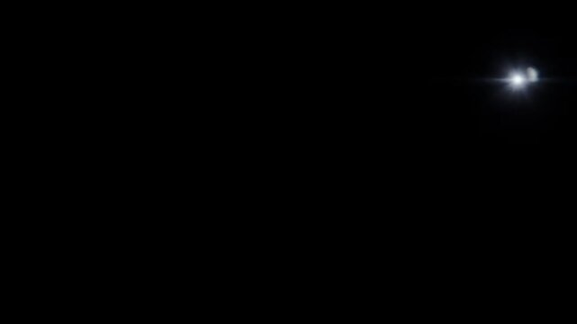 Bright Camera Flashes Flickering Against a Dark Black Background